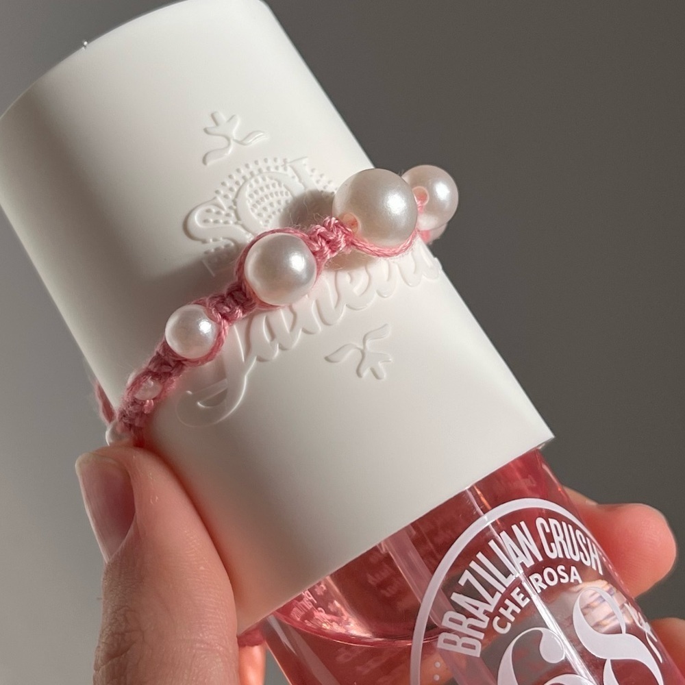Handmade woven friendship bracelet pink with fake pearl beads